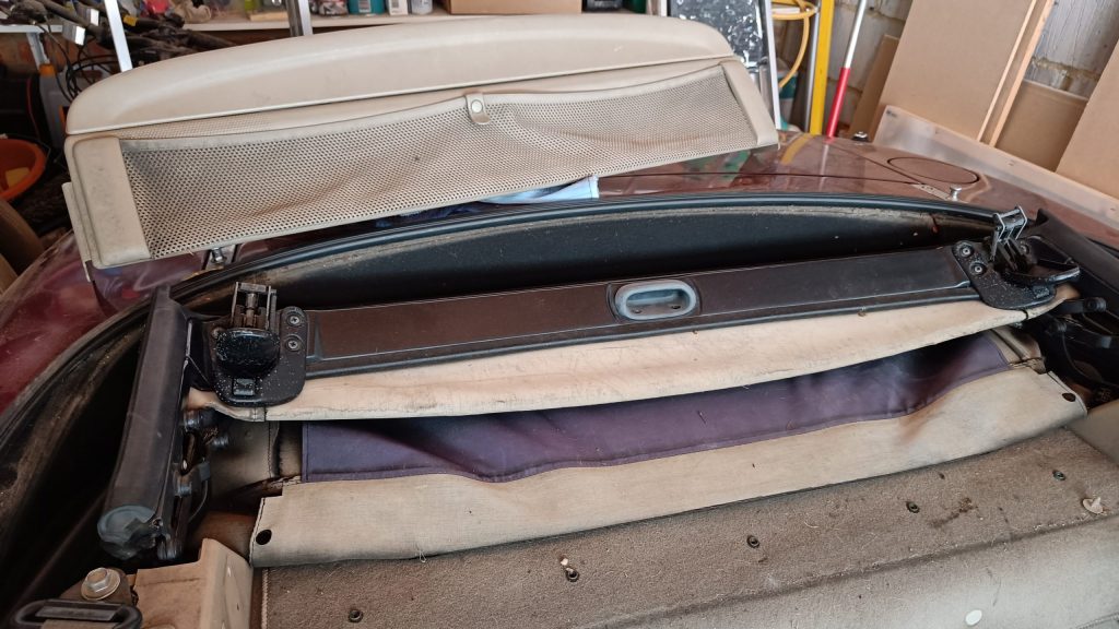 Image of soft top hood ready folded down ready for removal