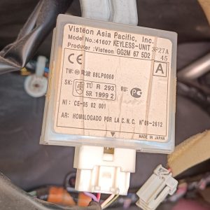 Image of key fob receiver unit under dash on passenger side.