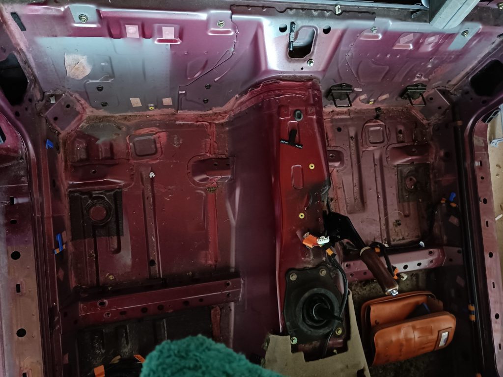 Image of rear of passenger area showing all looms have been removed