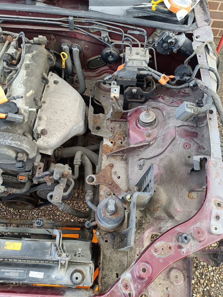 Image of space where airbox was after removal to give access to radiator lower hose.