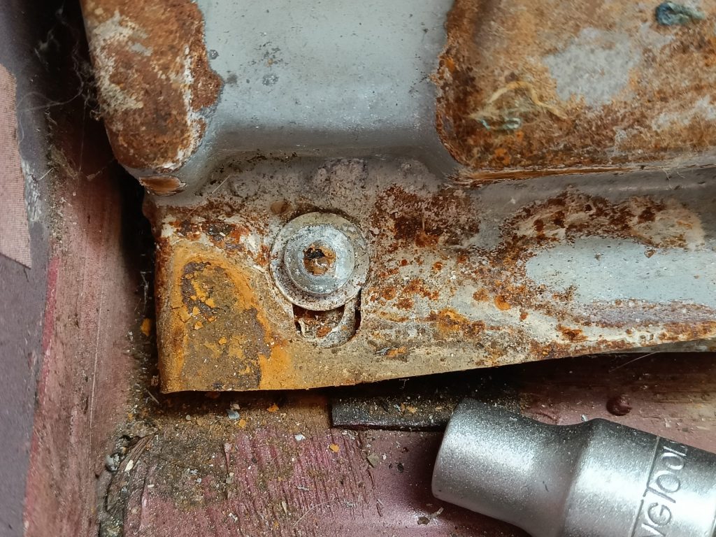 Image of tamperproof fitting on passenger footrest. ECU is behind here!