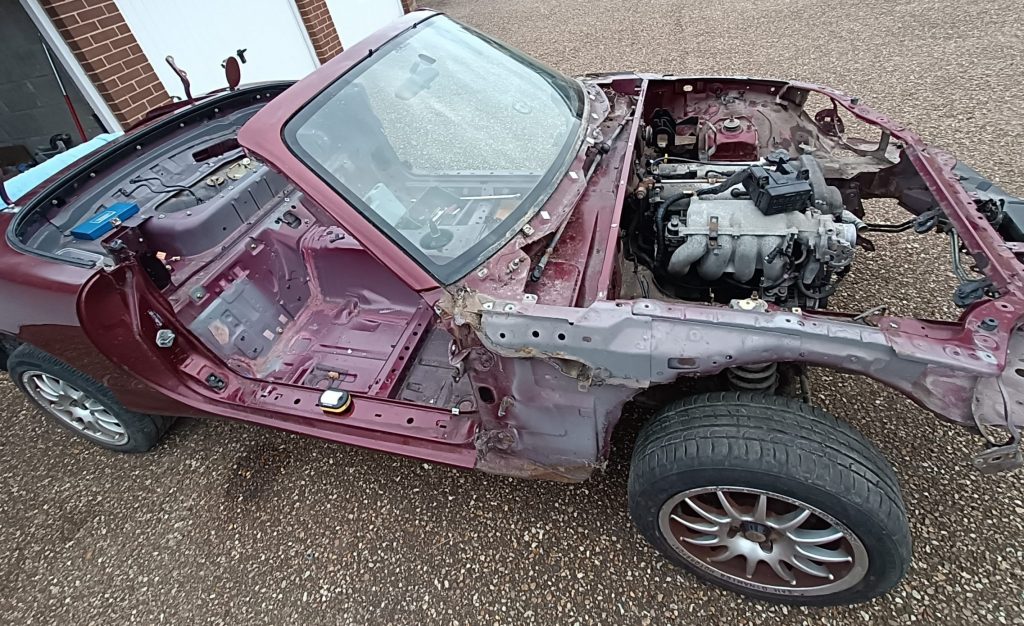 Image of donor MX-5 ready for shell off!