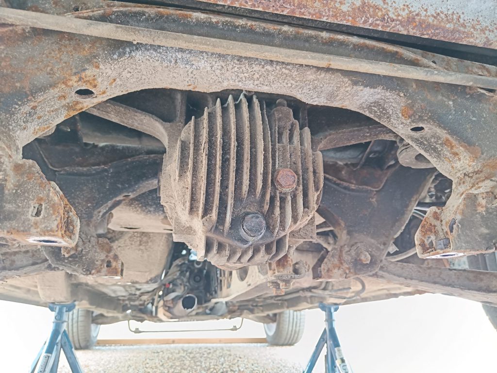 Image of underside rear of MX-5 showing diff ready to remove. The subframe bracing has already been removed.