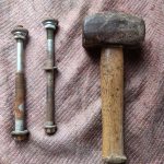 Image of PPF bolts with upper bushings after hammer applied.