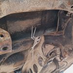 Image of PPF cable tied to rear subframe following diff removal.