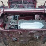 Image of scrap items inside boot space