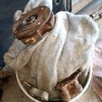 Image of diff 'nose' and fixings in a bucket awaiting refurbishment.