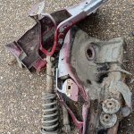 Image of the removed front inner wings and coil overs.
