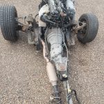 Image of engine, gearbox, front subframe and PPF after being rolled out from the body shell.