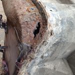 Image of rust hole in scrap passenger side sill.