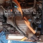 Image of removed engine sitting on trolley waiting for further dismantling and painting etc.