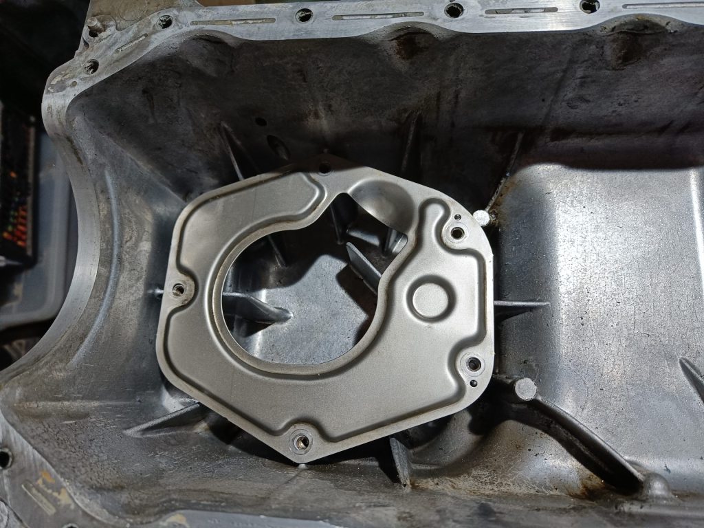 Image of internal oil sump baffle plate.