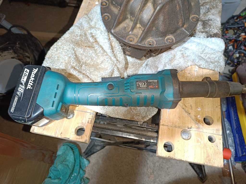 Image of a die grinder used to make short work of cleaning the differential.
