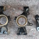Image of rear uprights and fuel filter bracket after final paint.