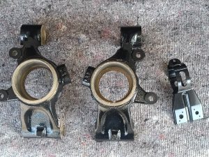 Image of rear uprights and fuel filter bracket after final paint.