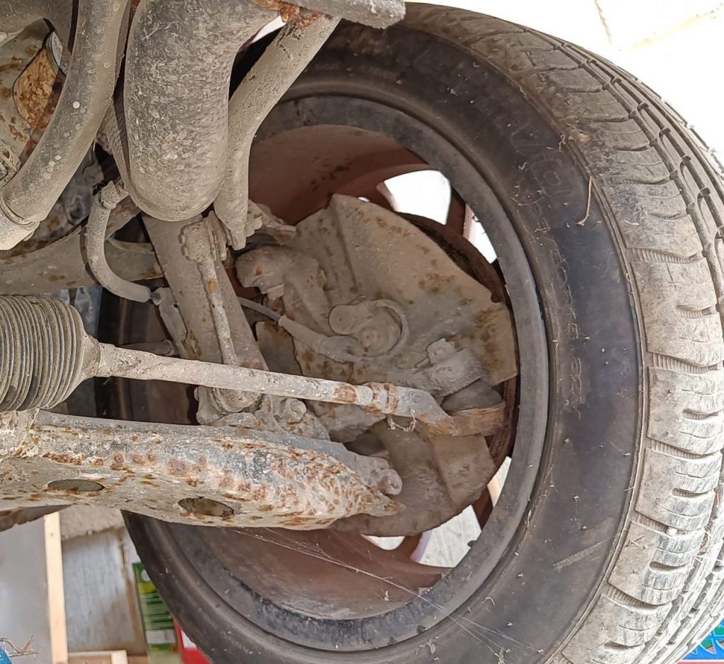 Image of NS front wheel hub assembly before dismantling and refurbishment.