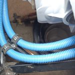 Image of lower rear flexible fuel line fising point.