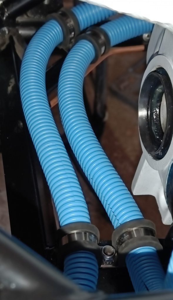 Image of lower forward flexible fuel line fixing point.