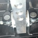 Image of pinned brake bais bar to prevent manual adjustment.