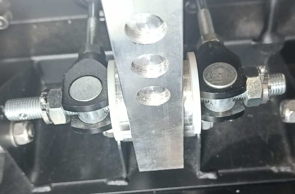 Image of pinned brake bais bar to prevent manual adjustment.