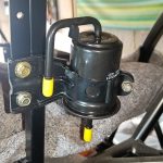 Image of fitted fuel filter and bracket.