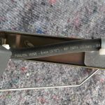 Image of extension to the fuel return pipe on the fuel pump assembly.