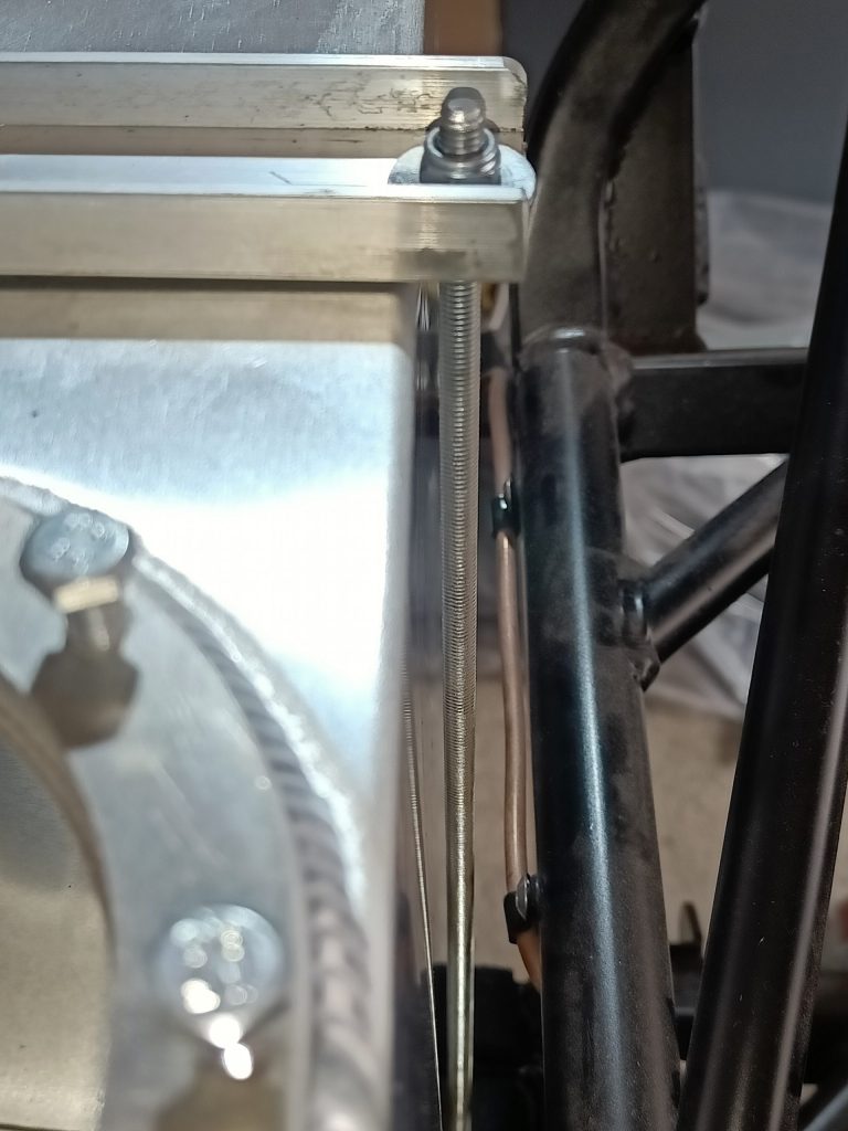 Image showing the forward most fuel tank threaded rod fitting and its clearance with the tank itself.