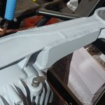 Image of differential housing after final paint top coats.