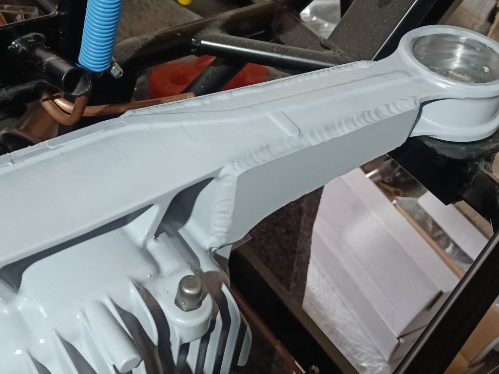 Image of differential housing after final paint top coats.