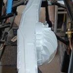Image of differential housing after final paint top coats.