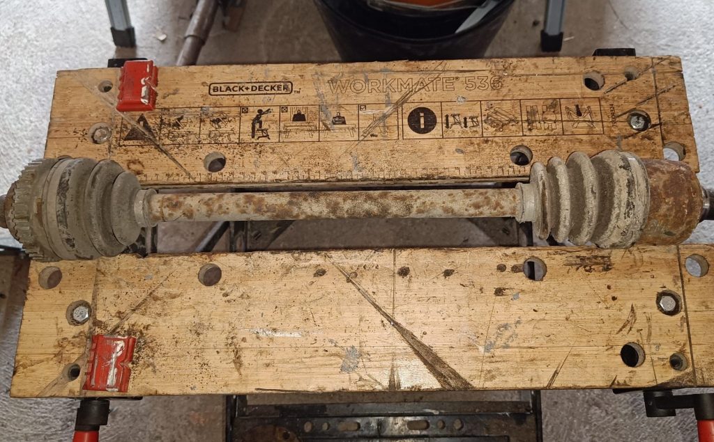 Image of driveshaft ready for cleaning / painting.