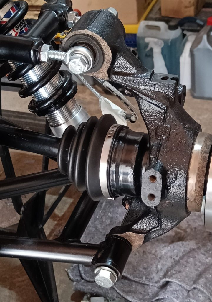 Image of outer CV joint end of nearside driveshaft fitted into hub.