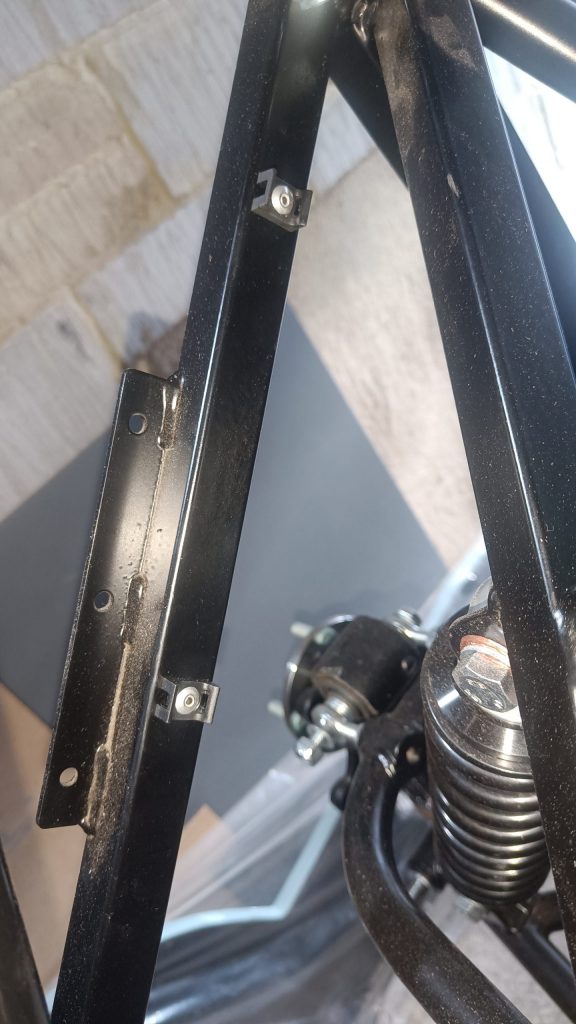 Image of nearside rear wiring saddles.