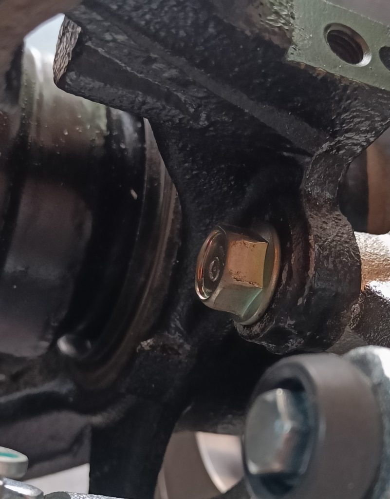Image of new OEM rear caliper fixing bolts