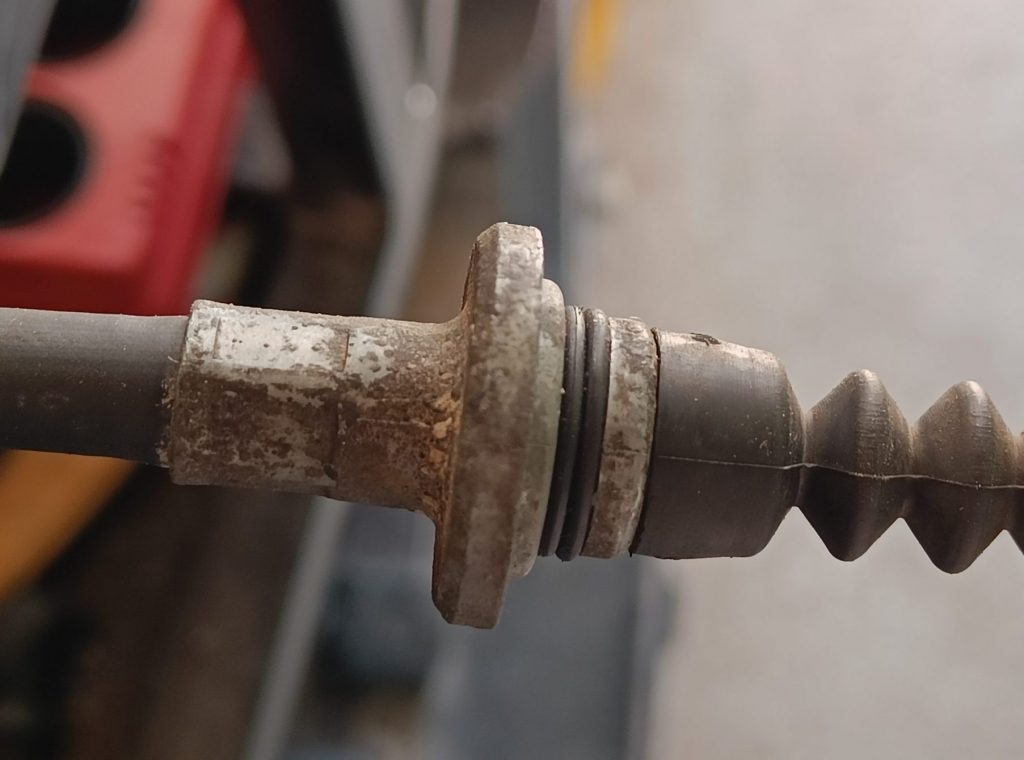 Image of O rings on handbrake cable in an attempt to make them a snug fit into the chassis tubes.