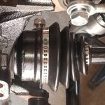 Image of outer CV joint end of offside driveshaft fitted into hub.