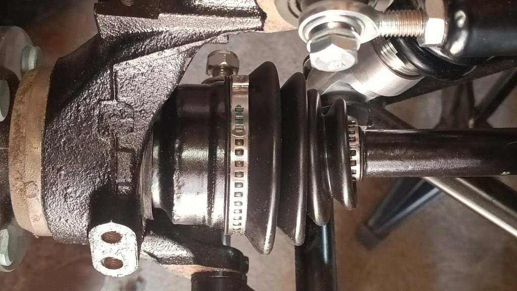 Image of outer CV joint end of offside driveshaft fitted into hub.
