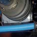 Image of clearance between OS inner CV joint boot and fuel pipe.