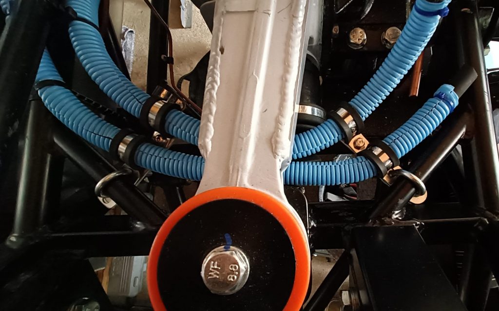 Image of final flexi fuel line routing utilising custom brackets.