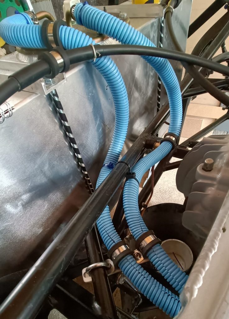 Image of final flexi fuel line routing utilising custom brackets.