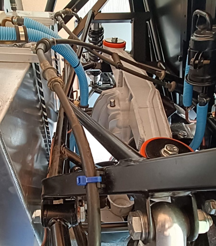 Image of how I have chosen to better secure the rear handbrake cable sections.