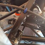 Image of cable tie & saddle fitted to better secure NS handbrake cable