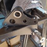 Image of NS front suspension rocker with bearings fitted together with the inner rings fitted to rocker shaft