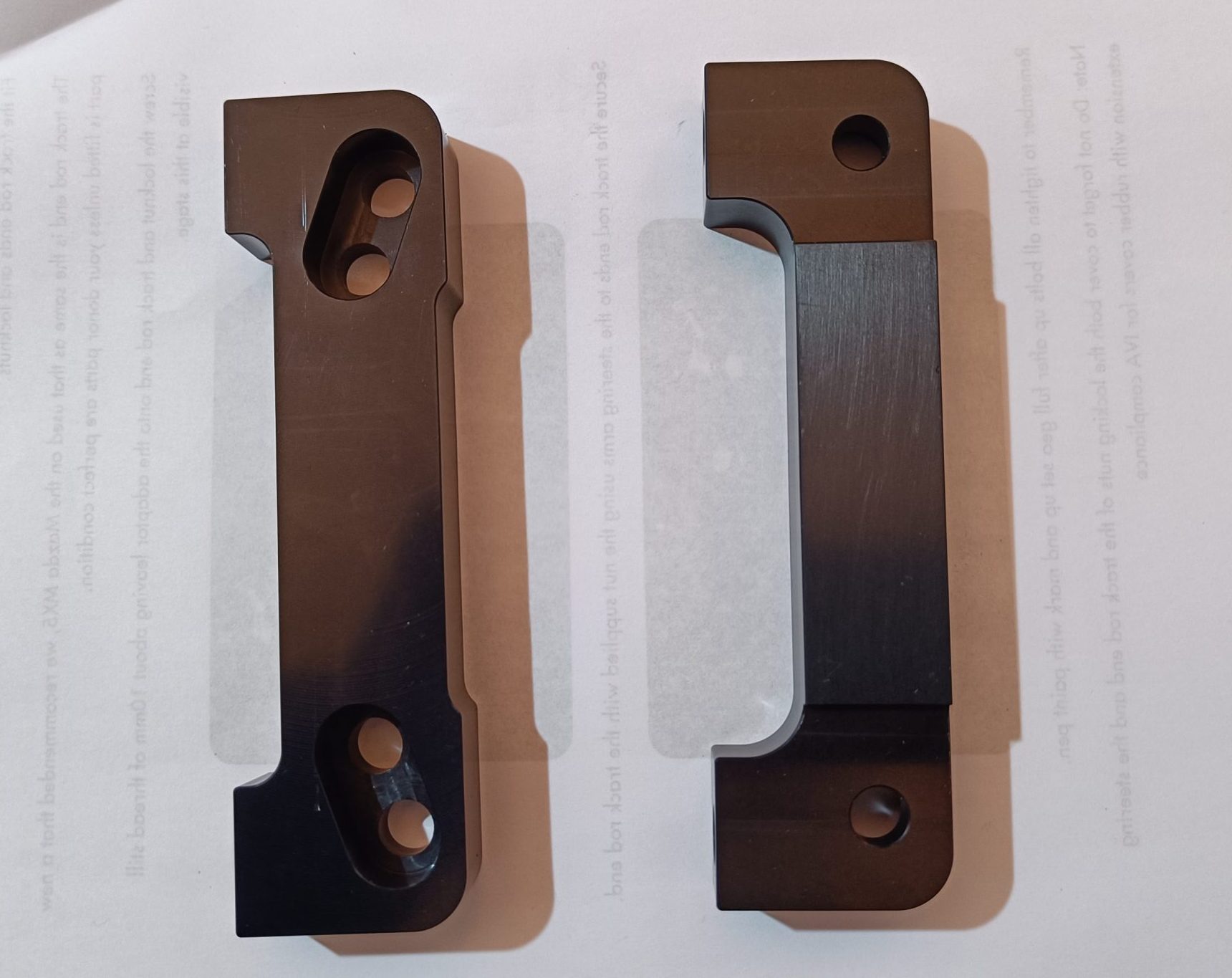 Image of the two different Wilwood front caliper bracket styles.