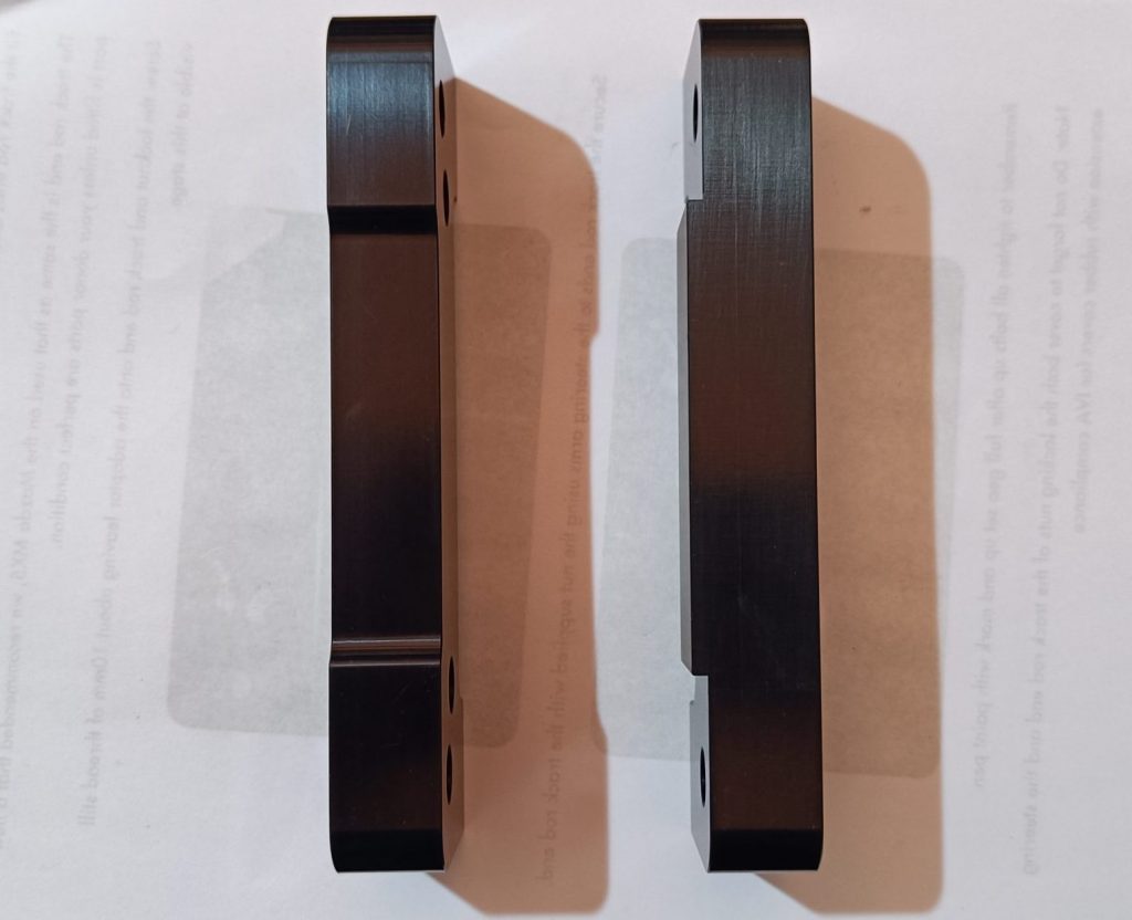 Image of the two different Wilwood front caliper bracket styles.