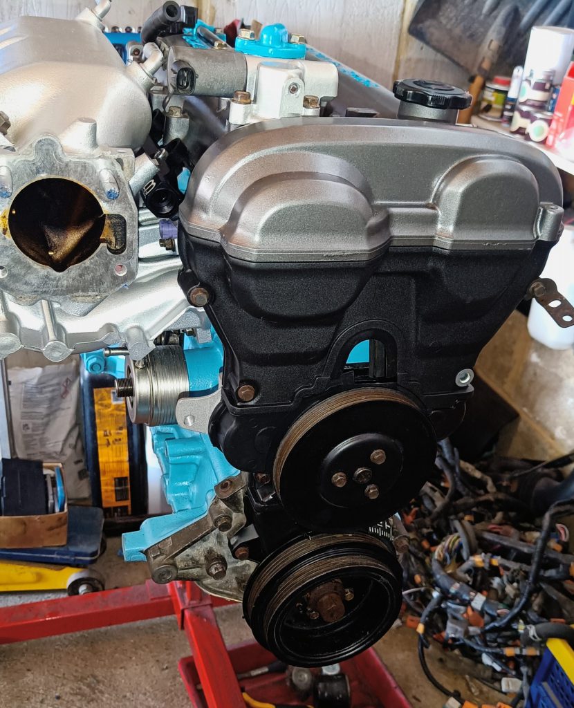 Image of newly reinstalled camshaft cover and VVT assembly.