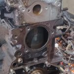 Image of front of engine block and head stripped an ready for paint.