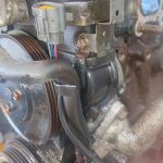 Image of LHS front of engine showing crank position sensor connector location.