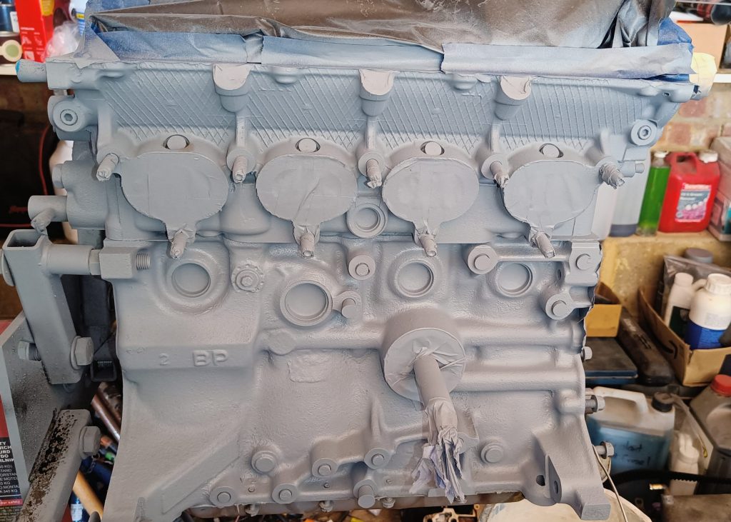 Image of RHS of engine now primed with VHT primer.