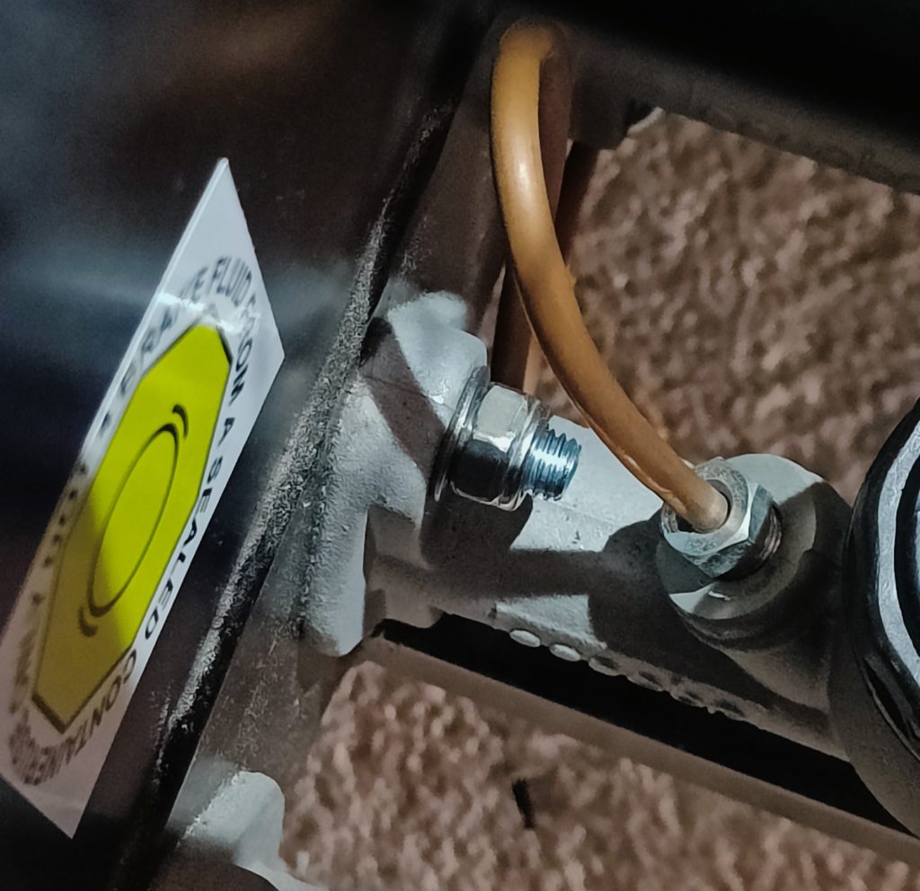 Image of newly installed brake & clutch master cylinder bolt.